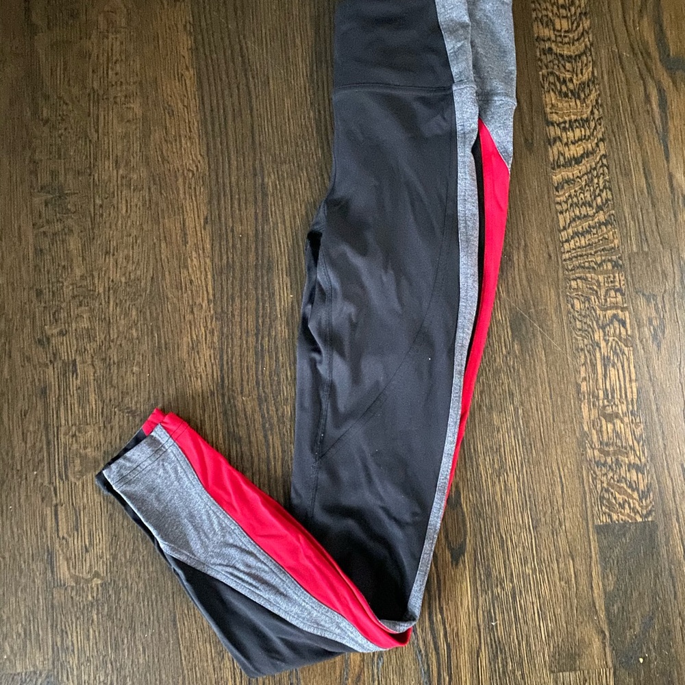 Like new Lulu pants with red & gray lines.